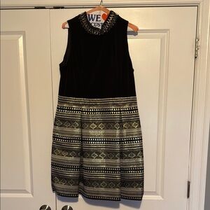 Sleeveless Black Dress with Gold Patterned Skirt